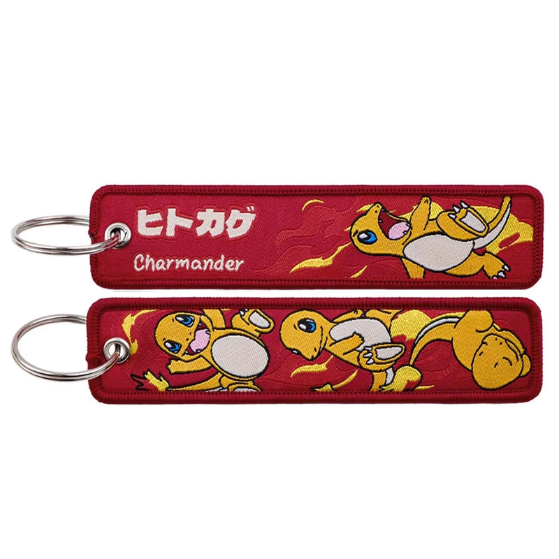 Back side view of Charmander embroidered keytag showing detailed stitching and fabric border
