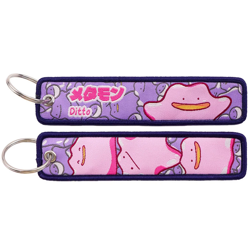 Back side view of Ditto embroidered keytag showing detailed stitching and fabric border