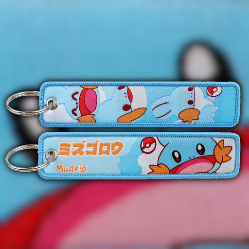 Mudkip blue woven fabric keytag attached to metal keyring featuring embroidered Mudkip artwork